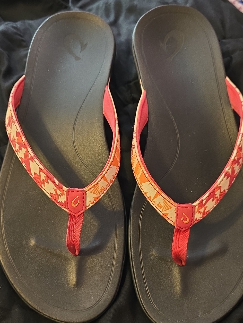 OluKai Women's Flip Sandals in Coral & Black with Patterned Straps